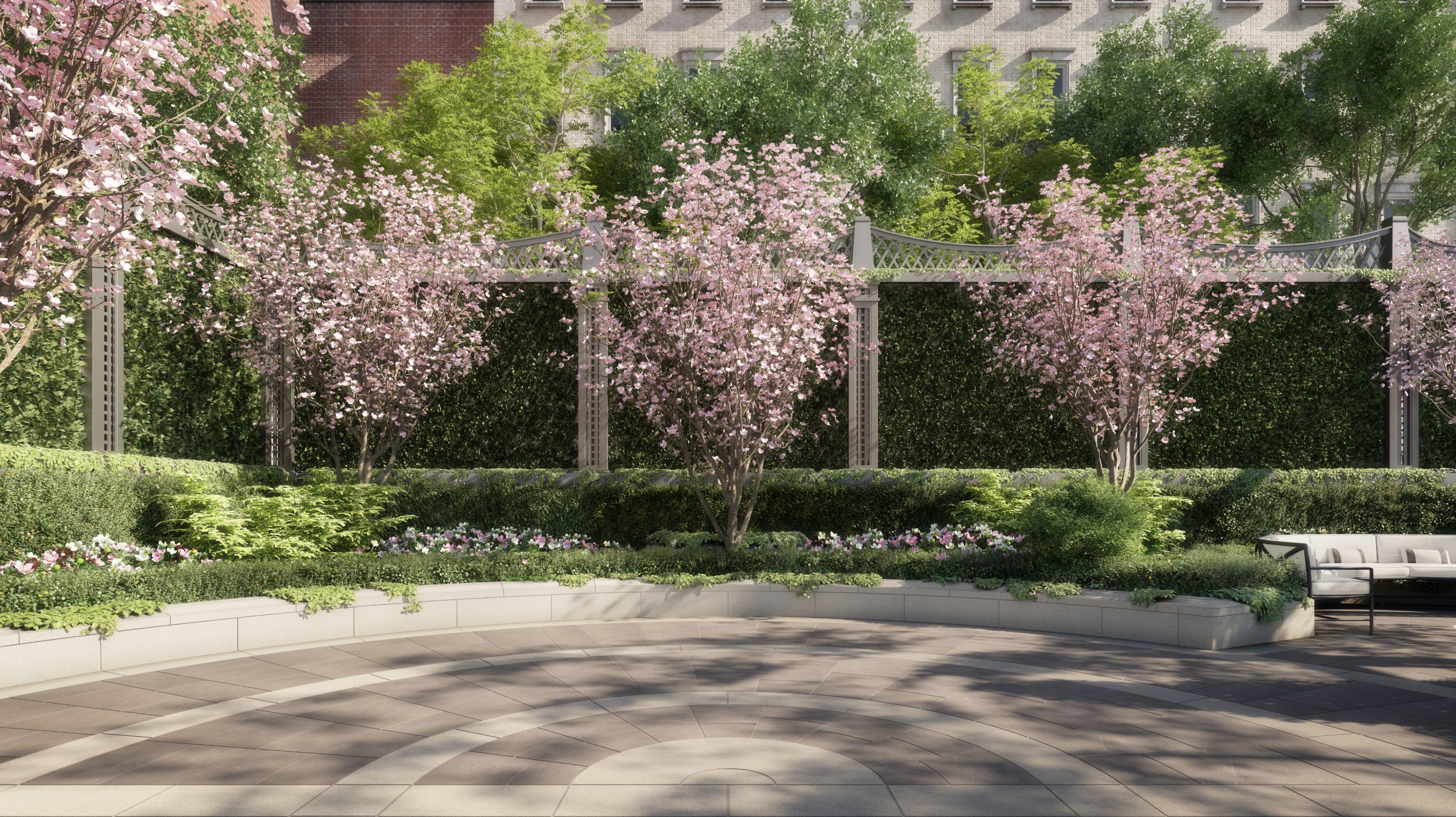 Lush outdoor spaces at The Henry Residences in the Upper West Side, featuring trees and serene greenery.