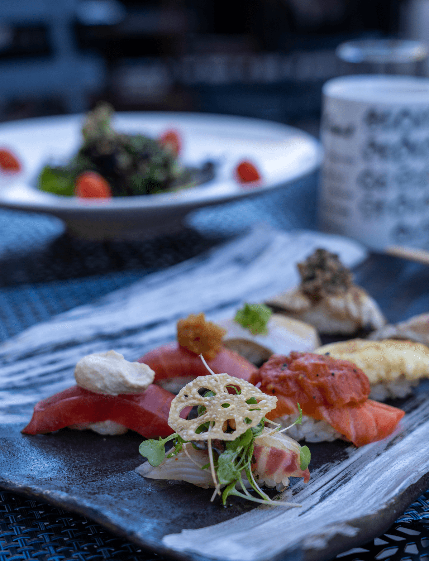 A beautifully arranged plate of sushi on a table at a restaurant near The Henry Residences in Upper West Side.