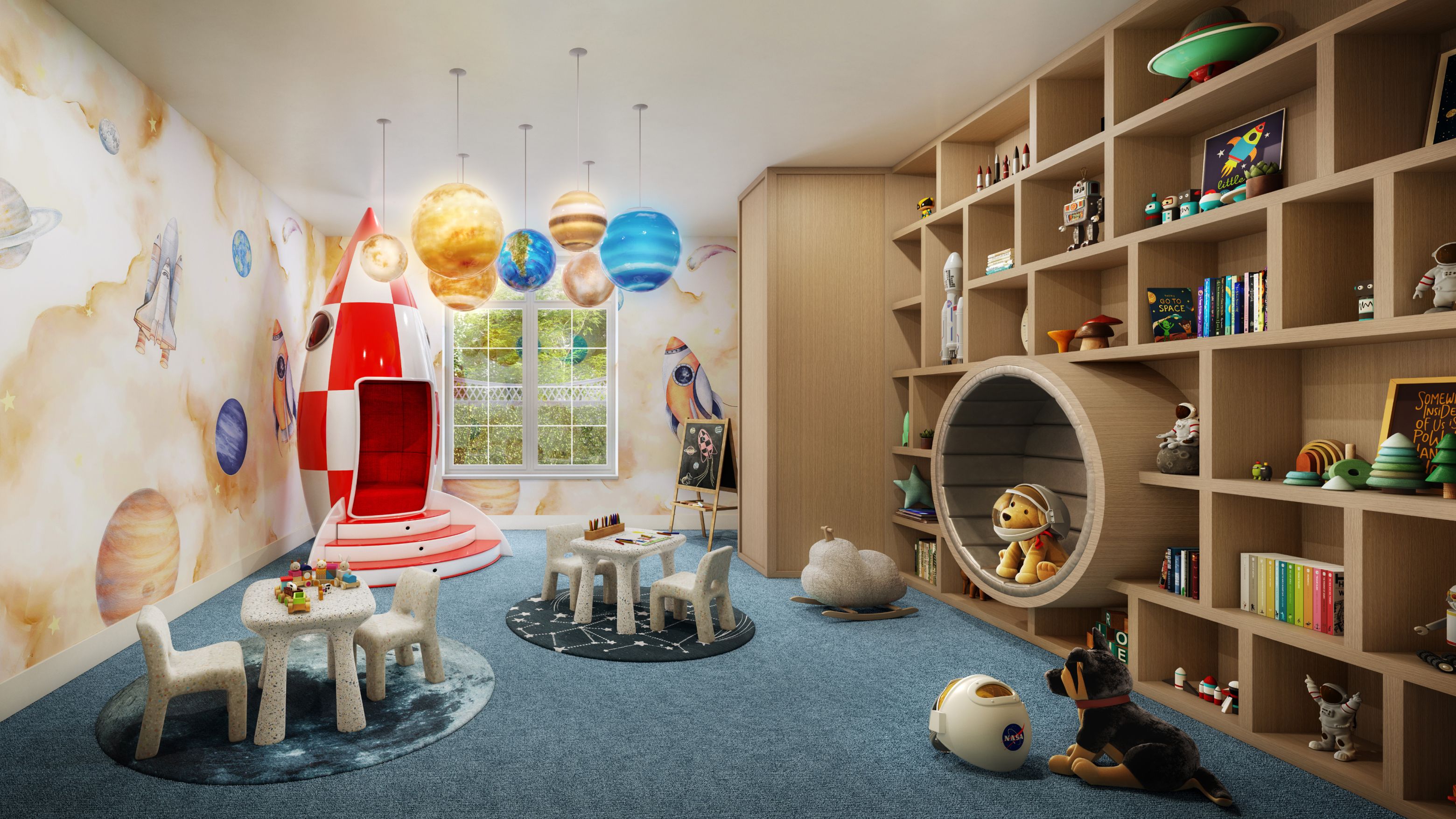 A vibrant children's playroom featuring a rocket ship and space-themed decor at The Henry Residences in the Upper West Side.