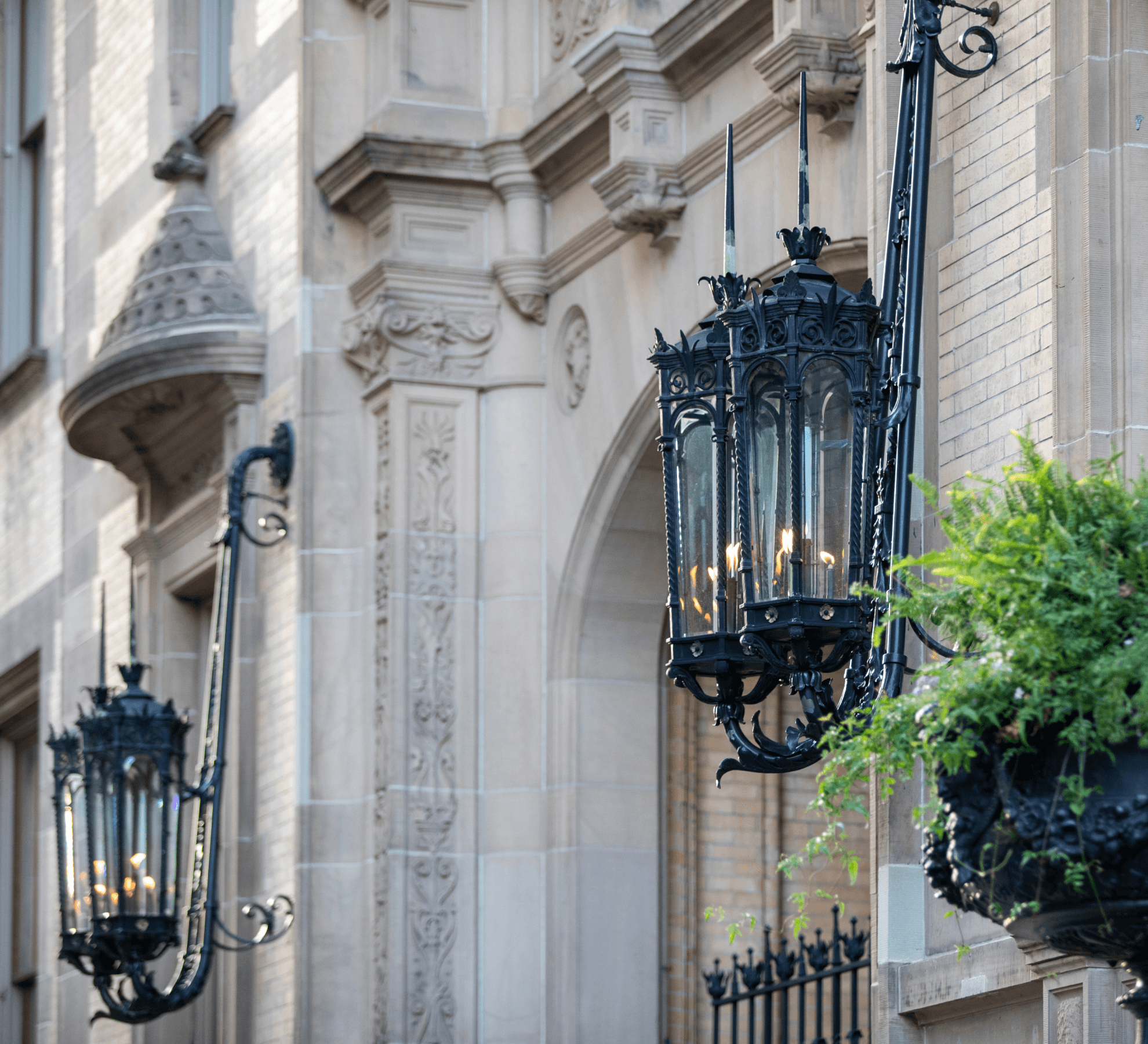 Elegant Upper West Side building adorned with wall lighting in neighborhood near The Henry Residences at 211 West 84th.