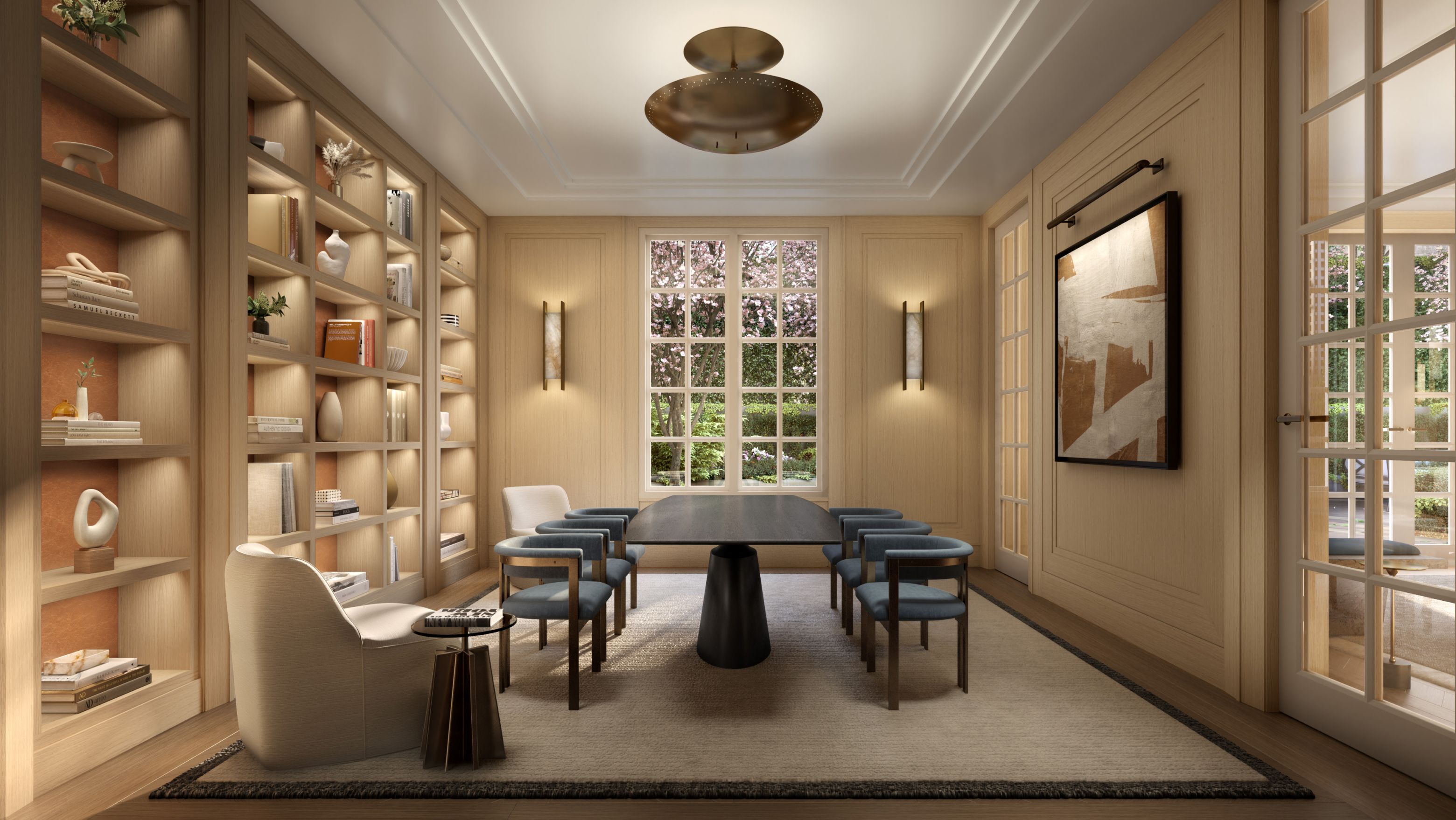 Spacious library with large table and extensive bookcases, showcasing elegance and comfort at The Henry UWS condominiums.