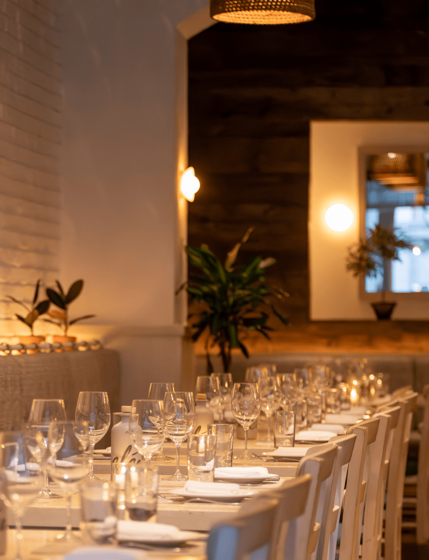 A refined Upper West Side restaurant table set up with wine glasses, situated near The Henry Residences at 211 W 84th St,