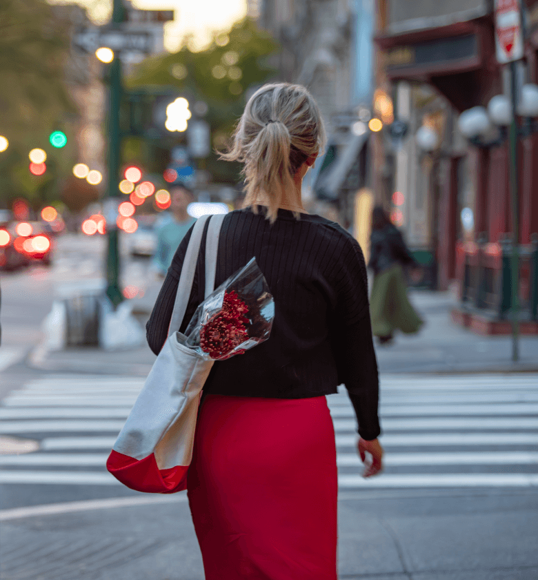 A woman walks down the street adjacent to The Henry Residences by Naftali Group in the Upper West Side.