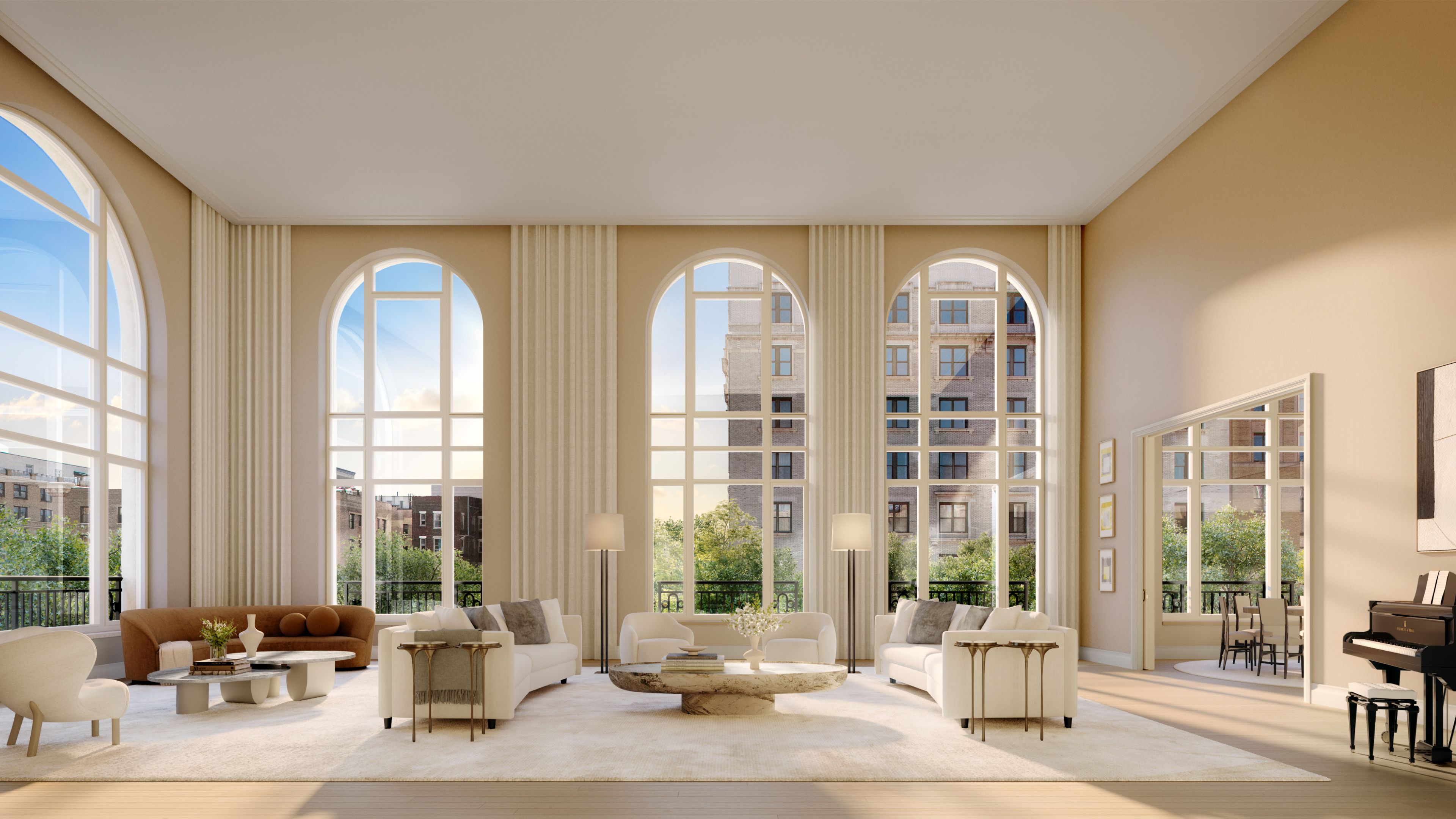 A spacious living room with huge arched windows, couches and piano, at The Henry Residences developed by Naftali Group.